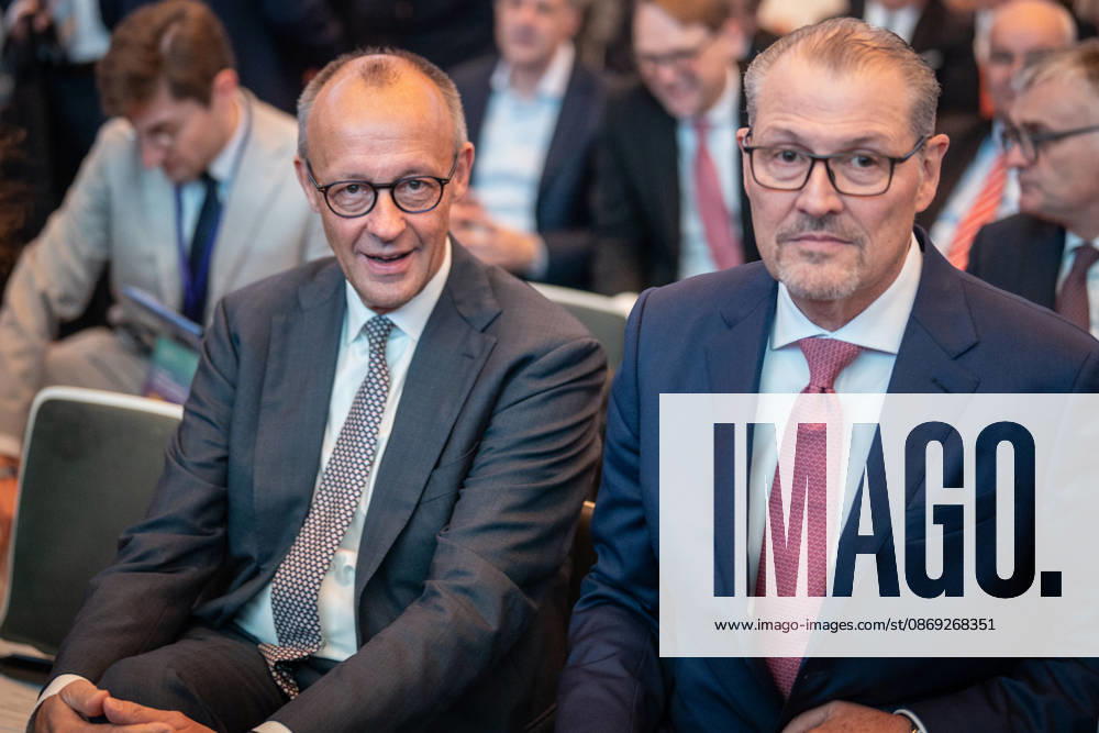 Chancellor Friedrich Merz is welcomed by Rainer Dulger, President of the Confederation of German Employers Associations (BDA), at the start of the 2026 German Employers Day, hosted by the Confederation of German Employers Associations (BDA), Berlin, Germany, at the Berlin Congress Center (bcc)