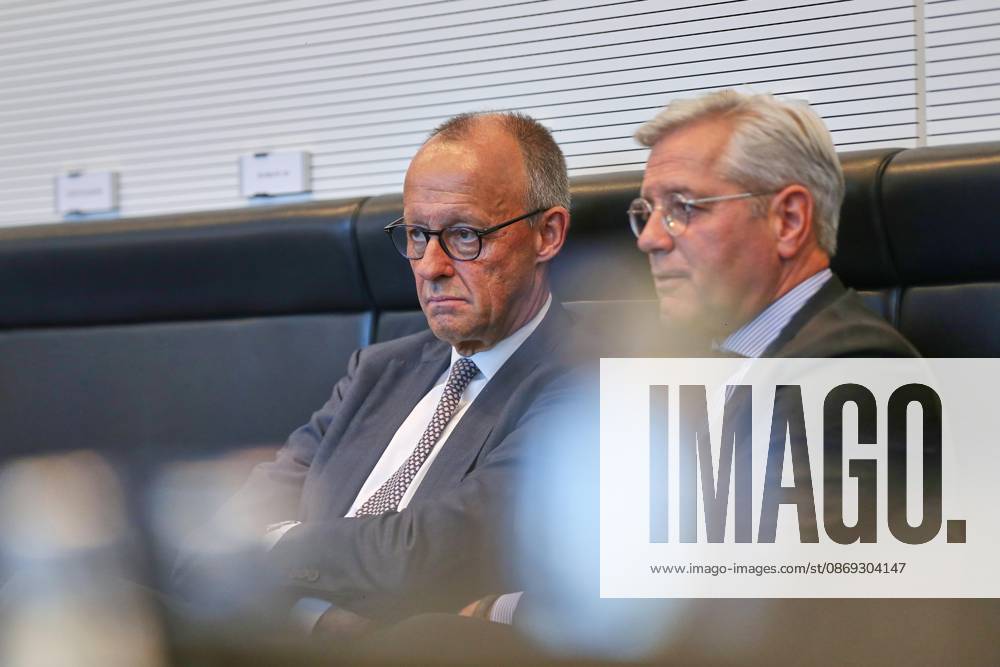 Berlin, Germany, October 13, 2026; Reichstag Building; CDU CSU parliamentary group meeting; Federal Chancellor Friedrich Merz (CDU) and Norbert Röttgen (CDU)