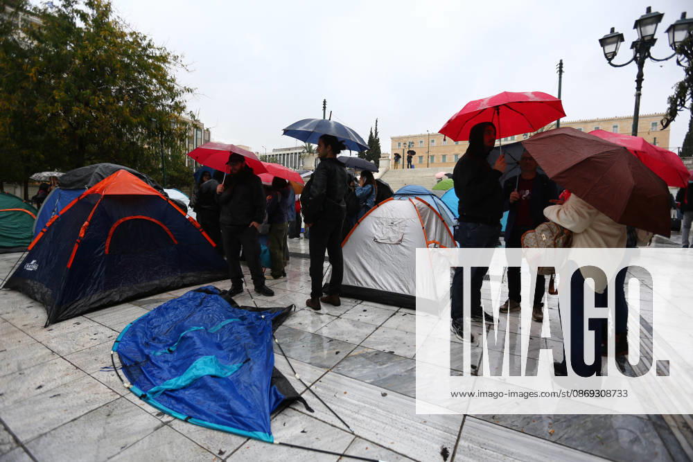 Protesters gather among camping tents in the rain during a student demonstration demanding measures to address housing and living costs. Athens GREECE - ZUMAx103 20261013_zip_x103_004