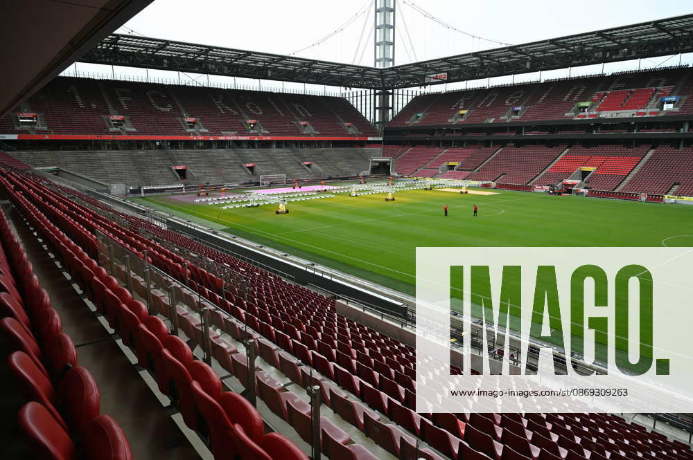 Interior shot of Cologne s RheinEnergie Stadium, turf maintenance, bleachers