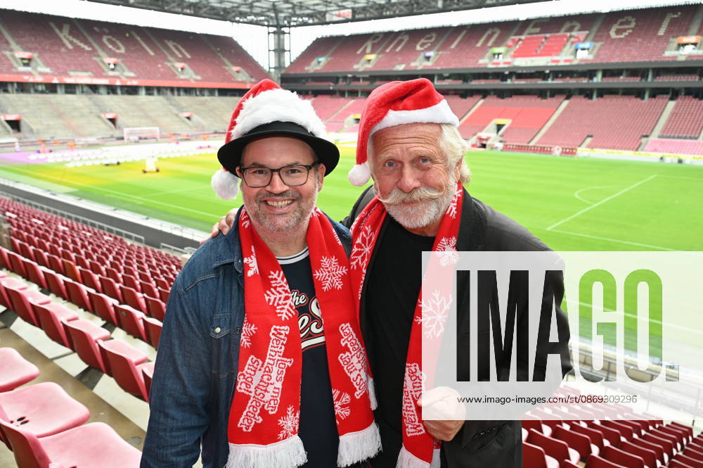 Musicians Björn Heuser and Henning Krautmacher, left to right, pose at the press conference for the Loss mer Weihnachtsleeder singe ( Let’s Sing Christmas Carols ) sing-along concert, which will take place this year on December 22 and 23, 2026, at Cologne’s RheinEnergie Stadium and is expected to draw over 90,000 fans