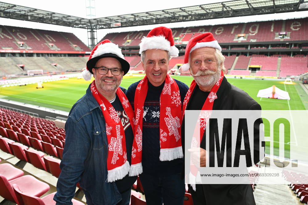 Musicians Björn Heuser, Michael Kokott, and Henning Krautmacher, from left to right, pose at the press conference for the Loss mer Weihnachtsleeder singe ( Let’s Sing Christmas Carols ) sing-along concert, which will take place this year on December 22 and 23, 2026, at Cologne’s RheinEnergie Stadium and is expected to draw over 90,000 fans