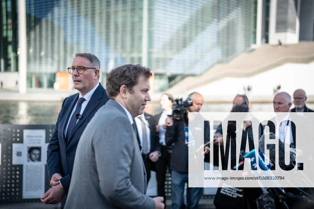 Lars Klingbeil, SPD Party Chairman and Federal Minister of Finance, and Alexander Schweitzer, Federal Minister of Labor-designate, at Friedrich-Ebert-Platz in front of the Bundestag building; introduction of the new Federal Minister of Labor on the day of his swearing-in by the SPD Party Chairman, Berlin, Berlin, Germany, Friedrich-Ebert-Platz