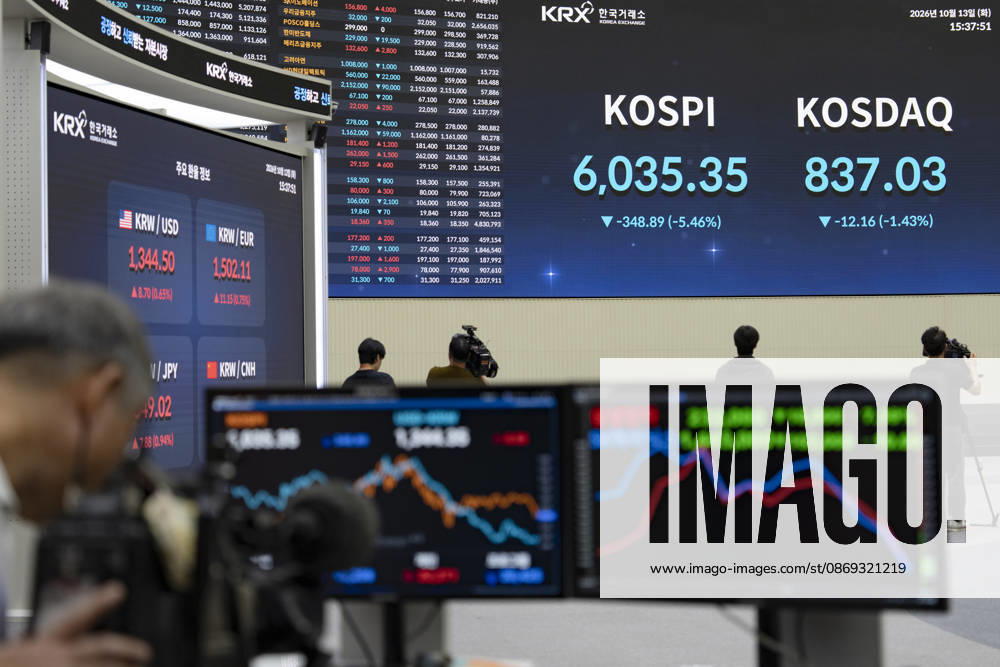 South Korea Stocks Plunge As KOSPI Drops Sharply At KRX In Seoul Media personnel and monitors in the Korea Exchange (KRX) trading hall display market data in Yeouido, Seoul, South Korea, on October 13, 2026. The KOSPI index dropped to 6,035.35, down 348.89 points (-5.46%), alongside the KRW USD exchange rate shown on side screens. Seoul Seoul South Korea