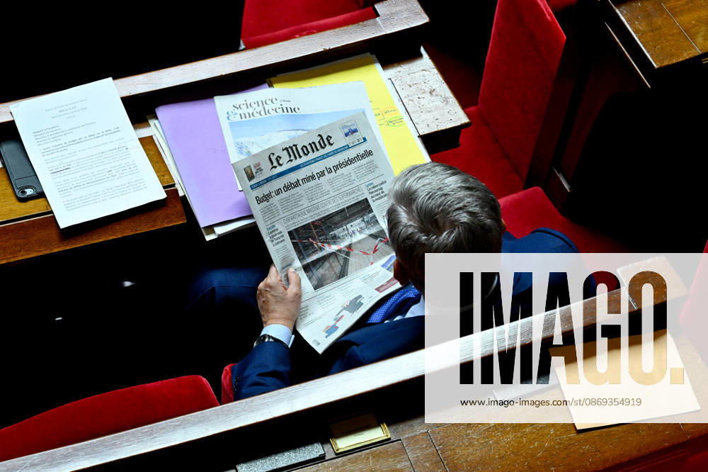2027 Finance Bill Part One at the National Assembly Illustration of a deputy reading Le Monde newspaper during the 2027 Finance Bill Part One at the National Assembly, French Parliament in Paris, France on octobre 13, 2026. Photo by Tomas Stevens ABACAPRESS.COM Paris France