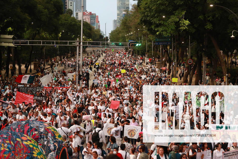 Thousands of healthcare workers hold national protest in Mexico City MEXICO CITY, MEXICO - OCTOBER 13: People take part in a national protest march demanding wage increases for healthcare workers and more medical supplies for Mexico s public health system, in Mexico City, Mexico on October 13, 2026. Thousands of members of the Mexican Social Security Institute (IMSS) marched to demand higher wages, improved working conditions, and action to address nationwide shortages of basic medicines and supplies across public hospitals. Daniel Cardenas Anadolu Mexico City Mexico. Editorial use only. Please get in touch for any other usage.