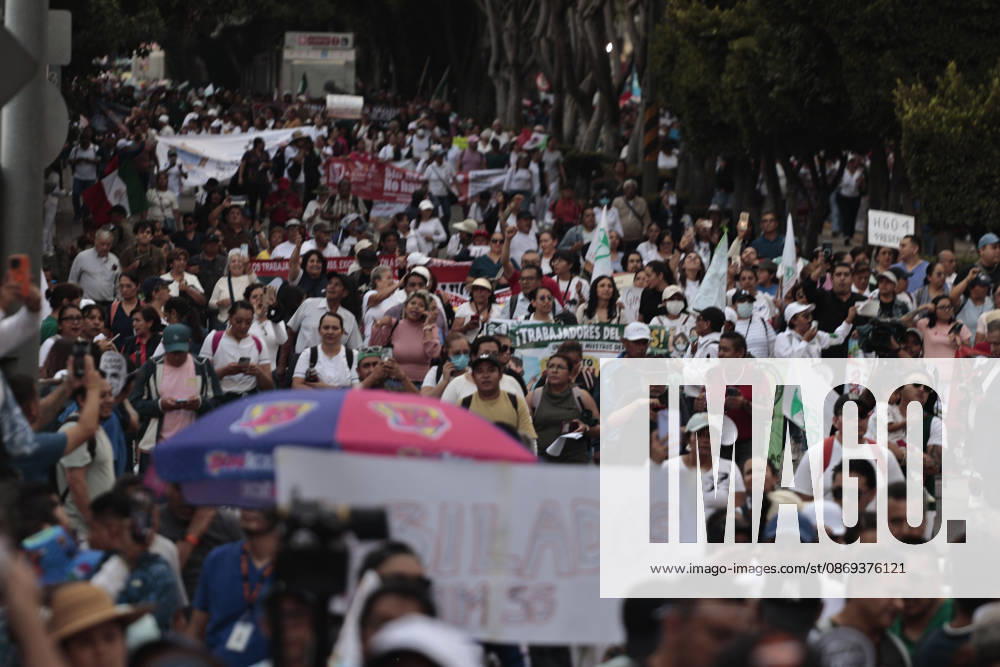 Thousands of medical and healthcare workers from the Mexican Social Security Institute (IMSS) are staging a massive nationwide protest. In Mexico City, demonstrations are taking place at headquarters and hospitals, with the main march heading toward the union s offices; the march began at the government-run Siglo XXI Hospital which relies on federal funding and serves employees from various Mexican government agencies. The protest stems from workers demands for better working conditions, specifically addressing excessive workloads, unfilled vacancies across all departments, and the need for proper maintenance of clinical and hospital facilities as well as workplace safety standards. Other dema - ZUMAp204 20261013_zip_p204_057