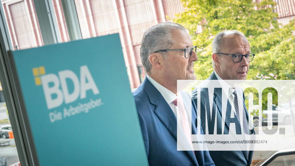 Chancellor Friedrich Merz is welcomed by Rainer Dulger, President of the Confederation of German Employers Associations (BDA), at the start of the 2026 German Employers Day, hosted by the Confederation of German Employers Associations (BDA), Berlin, Germany, at the Berlin Congress Center (bcc)