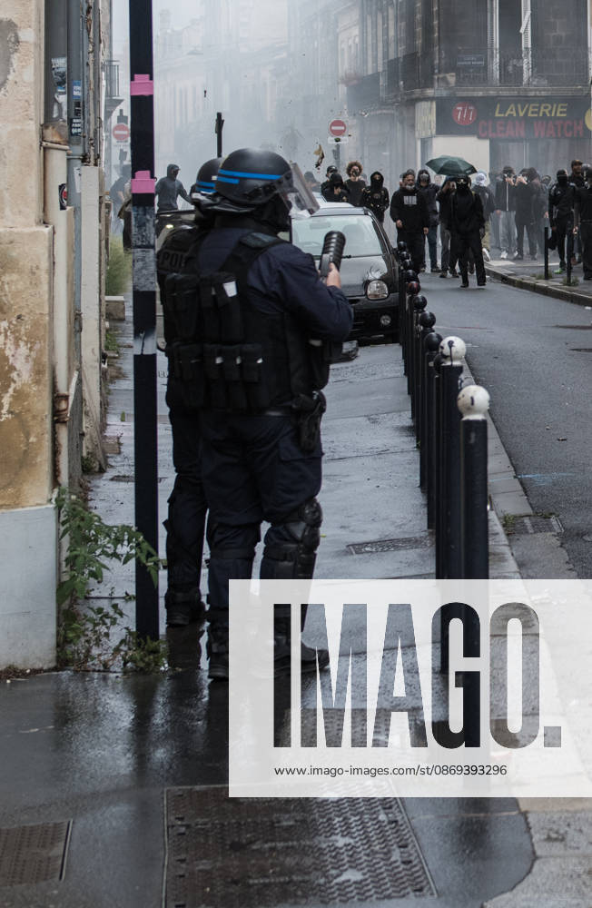 High School Stdent Mobilisation - Bordeaux A police officer in riot gear faces protesters in a street filled with tear gas during Act V of the high school student mobilisation in Bordeaux, France on October 13, 2026. Photo by Fabrice Sapte ABACAPRESS.COM Bordeaux France