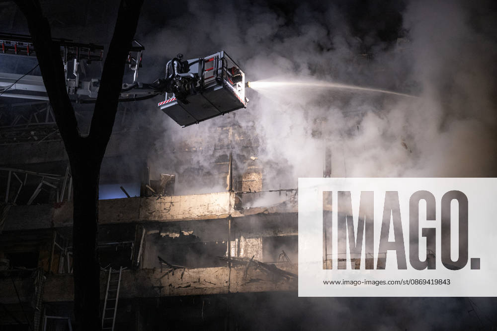 A rescuer on an aerial platform extinguishes a fire that broke out following a Russian missile strike on a nine-story residential building in Kyiv’s Desnianskyi district, Ukraine, on October 14, 2026. Russia launched a massive ballistic missile attack on the capital. Three women were killed and 19 other people were injured in the Desnianskyi district, including a seven-year-old girl. Apartments in the nine-story building were also damaged from the first through the eighth floor (Photo by Danylo Antoniuk Ukrinform) Ballistic missile strikes next to nine-story residential building in Desnianskyi district of Kyiv