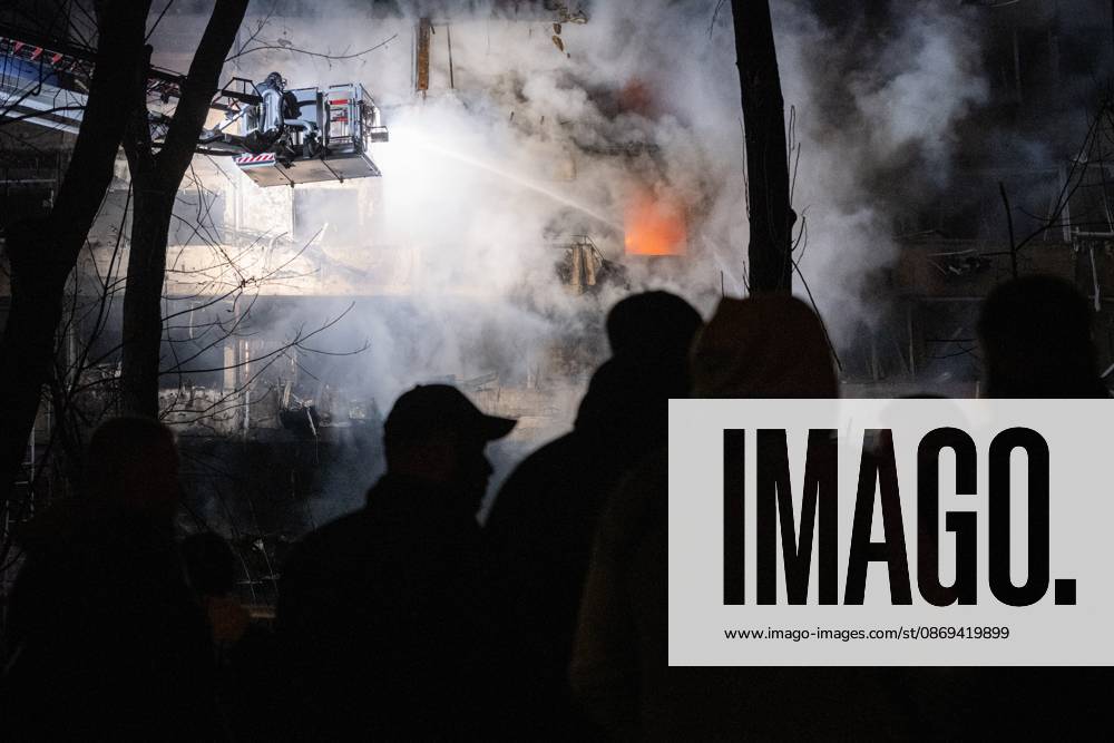 A rescuer on an aerial platform extinguishes a fire that broke out following a Russian missile strike on a nine-story residential building in Kyiv’s Desnianskyi district, Ukraine, on October 14, 2026. Russia launched a massive ballistic missile attack on the capital. Three women were killed and 19 other people were injured in the Desnianskyi district, including a seven-year-old girl. Apartments in the nine-story building were also damaged from the first through the eighth floor (Photo by Danylo Antoniuk Ukrinform) Ballistic missile strikes next to nine-story residential building in Desnianskyi district of Kyiv