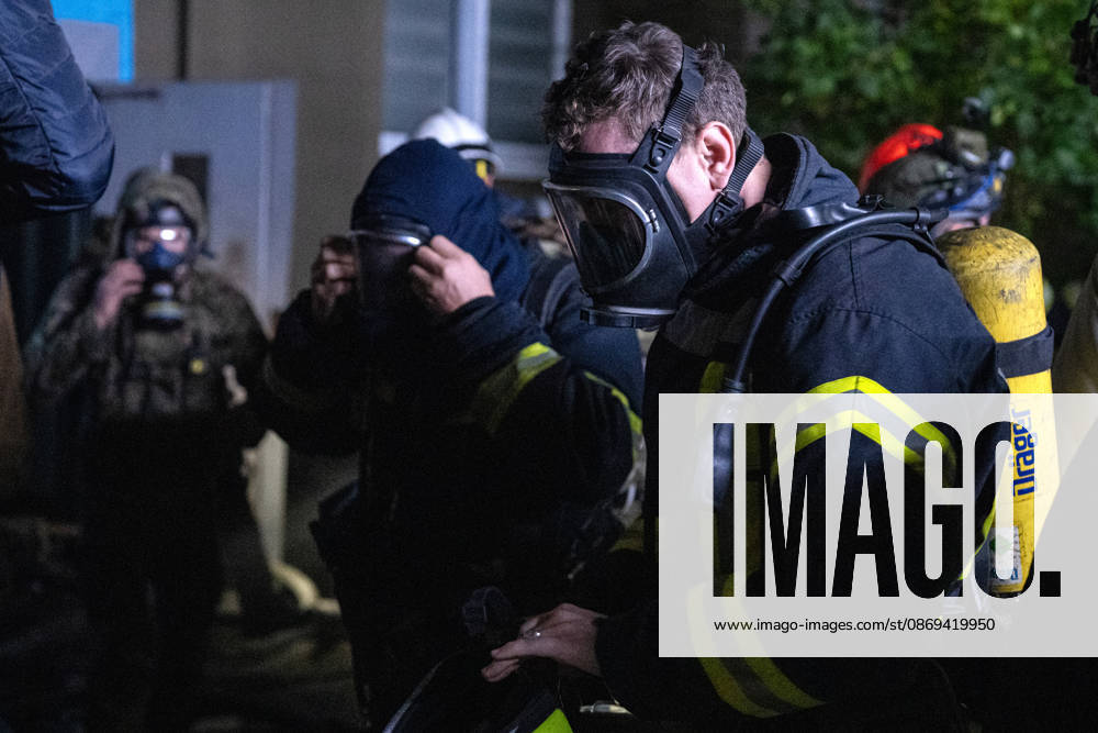 Rescuers work at the site of a Russian missile strike on a nine-story residential building in Kyiv’s Desnianskyi district, Ukraine, on October 14, 2026. Russia launched a massive ballistic missile attack on the capital. Three women were killed and 19 people were injured in the Desnianskyi district, including a seven-year-old girl. Apartments on the first through eighth floors of the building were also damaged (Photo by Danylo Antoniuk Ukrinform) Ballistic missile strikes next to nine-story residential building in Desnianskyi district of Kyiv