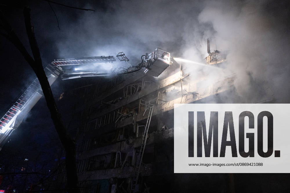Ballistic missile strikes next to nine-story residential building in Desnianskyi district of Kyiv A rescuer on an aerial platform extinguishes a fire that broke out following a Russian missile strike on a nine-story residential building in Kyiv’s Desnianskyi district, Ukraine, on October 14, 2026. Russia launched a massive ballistic missile attack on the capital. Three women were killed and 19 other people were injured in the Desnianskyi district, including a seven-year-old girl. Apartments in the nine-story building were also damaged from the first through the eighth floor, Credit:Danylo Antoniuk Ukrinform Avalon Ukraine, Kyiv
