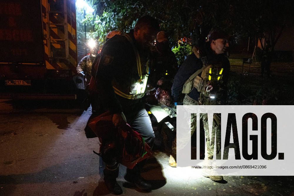 3 Dead and 19 Injured as Russian Missile Hits Residential Building - Kyiv Rescuers carry on a stretcher a person injured in a Russian missile strike on a nine-story residential building in Kyiv? Desnianskyi district, Ukraine, on October 14, 2026. Russia launched a massive ballistic missile attack on the capital. Three women were killed and 19 people were injured in the Desnianskyi district, including a seven-year-old girl. Apartments on the first through eighth floors of the building were also damaged Photo by Danylo Antoniuk Ukrinform ABACAPRESS.COM Kyiv Ukraine