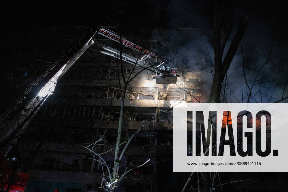 Ballistic missile strikes next to nine-story residential building in Desnianskyi district of Kyiv A rescuer on an aerial platform extinguishes a fire that broke out following a Russian missile strike on a nine-story residential building in Kyiv’s Desnianskyi district, Ukraine, on October 14, 2026. Russia launched a massive ballistic missile attack on the capital. Three women were killed and 19 other people were injured in the Desnianskyi district, including a seven-year-old girl. Apartments in the nine-story building were also damaged from the first through the eighth floor, Credit:Danylo Antoniuk Ukrinform Avalon Ukraine, Kyiv