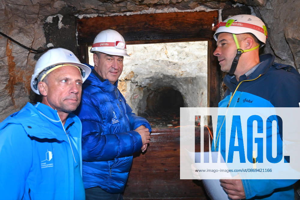 Markus SOEDER, Minister-President of Bavaria and CSU Chairman, stands in front of the entrance to a tunnel, examining the permafrost inside,which is melting year after year as a result of climate change. Minister-Preside