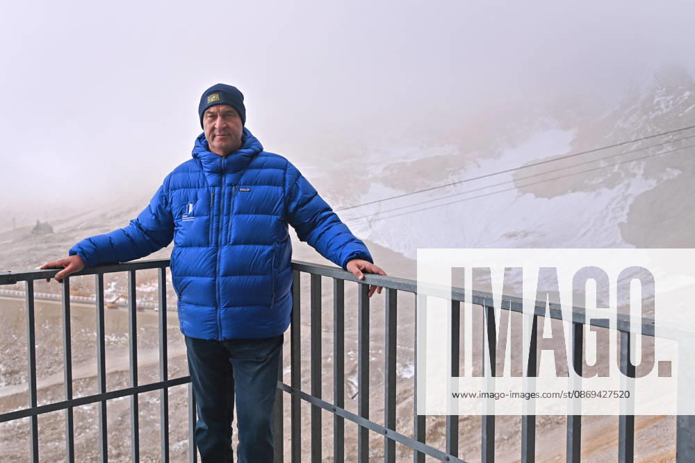 Markus SOEDER, Minister-President of Bavaria and CSU Chairman, in front of the shrinking Schneeferner Glacier on the Zugspitzplatt beneath a thick blanket of clouds. Minister-President Dr. Markus Soeder and Environment Minister Thorsten Glauber are briefed