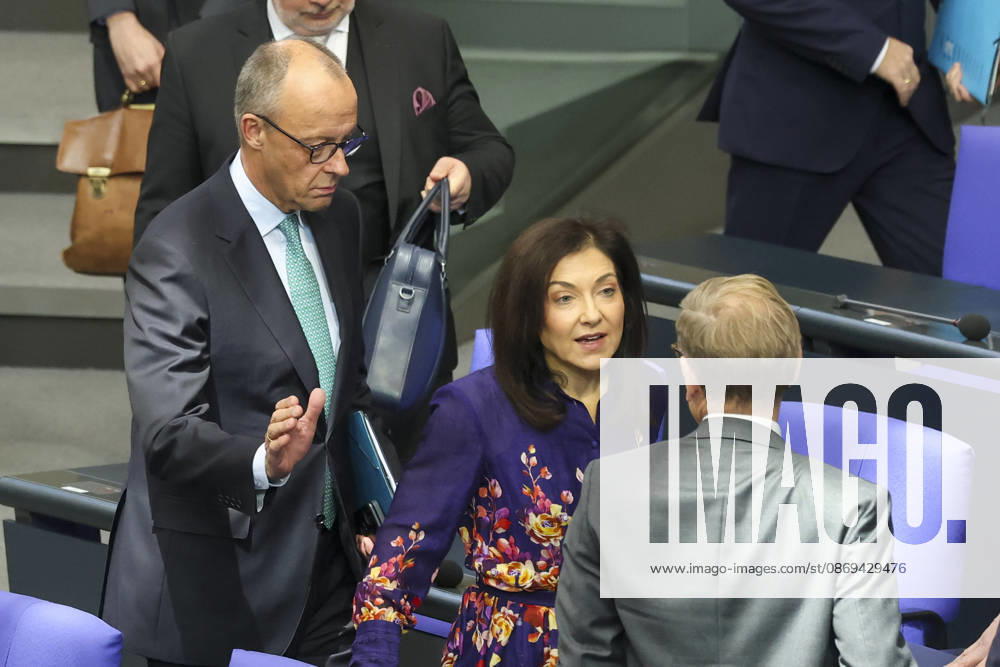 Friedrich Merz, Katherina Reiche, and Johann Wadephul at the session of the German Bundestag on October 14, 2026, in Berlin; Chancellor Merz delivering the government statement to the German Bundestag