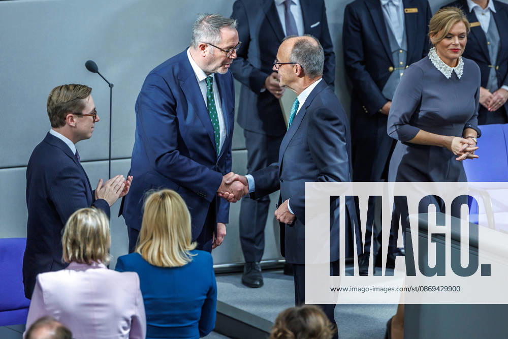 Bundestag: Federal Chancellor Friedrich Merz (CDU) and Alexander Schweitzer (SPD), Federal Minister of Labor and Social Affairs, after being sworn in at the German Bundestag on October 14, 2026, in Berlin, Berlin, Berlin, Germany, Bundestag