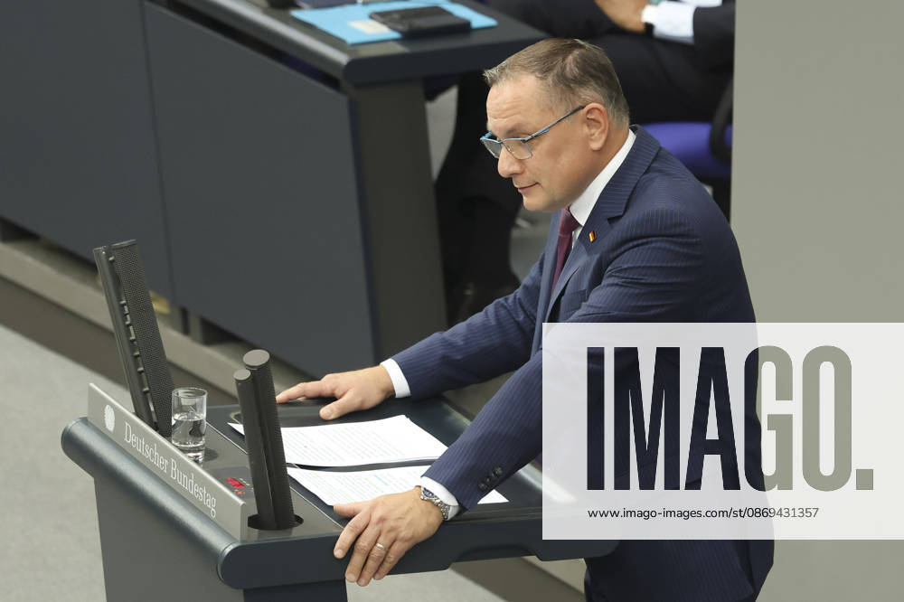 Tino Chrupalla at the session of the German Bundestag on October 14, 2026, in Berlin; Chancellor Merz delivering the government s policy statement to the German Bundestag