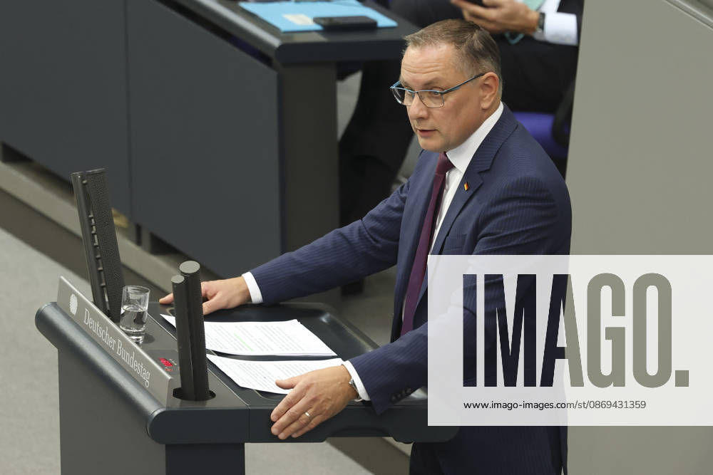 Tino Chrupalla at the session of the German Bundestag on October 14, 2026, in Berlin; Chancellor Merz delivering the government s policy statement to the German Bundestag