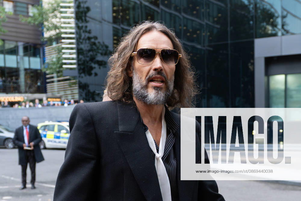 Actor and comedian RUSSELL BRAND arrives at Southwark Crown Court in London, as his trial on charges of rape, sexual assault and indecent assault continues. Brand has pleaded not guilty to all charges. London United Kingdom - ZUMAk172 20261014_zip_k172_004