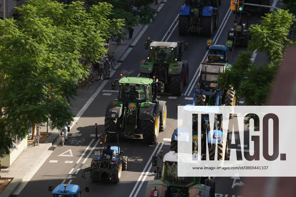 Tractor Rally for Agriculture in Barcelona: Protesters during a rally of tractors from various parts of Catalonia in front of the Government Delegation and statements, on October 14, 2026, in Barcelona, Catalonia, Spain. The demonstration, organized by Unió de Pagesos with the support of Asaja, FCAC, and Revolta Pagesa, denounces the structural crisis in the agricultural sector in Barcelona. OCTOBER 14, 2026, Spain