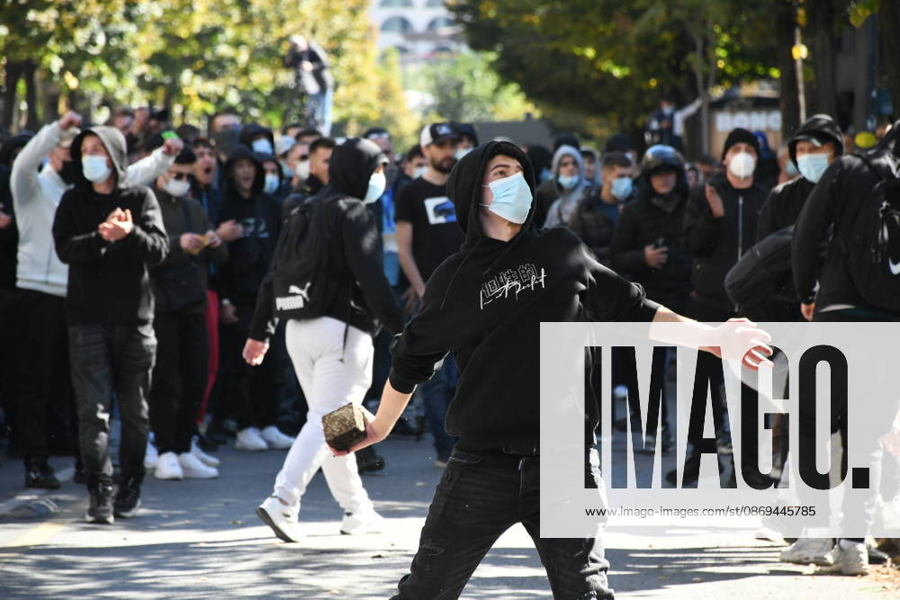 Clashes erupt outside Ministry of Education in Tirana during student protest over academic conditions TIRANA, ALBANIA - OCTOBER 14: University students stage protest outside the Ministry of Education building in Tirana, Albania, on October 14, 2026. A protest organized by university students demanding improvements to educational infrastructure and funding escalated into violent clashes as civic supporters joined the crowds. Demonstrators hurled Molotov cocktails, stones, and improvised projectiles at the ministry and law enforcement officers, setting fire to trash containers. In response, law enforcement officers used water cannons and tear gas to disperse the protesters. Olsi Shehu Anadolu Tirana Albania. Editorial use only. Please get i