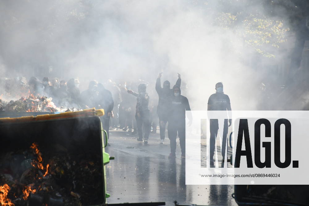 Clashes erupt outside Ministry of Education in Tirana during student protest over academic conditions TIRANA, ALBANIA - OCTOBER 14: University students stage protest outside the Ministry of Education building in Tirana, Albania, on October 14, 2026. A protest organized by university students demanding improvements to educational infrastructure and funding escalated into violent clashes as civic supporters joined the crowds. Demonstrators hurled Molotov cocktails, stones, and improvised projectiles at the ministry and law enforcement officers, setting fire to trash containers. In response, law enforcement officers used water cannons and tear gas to disperse the protesters. Olsi Shehu Anadolu Tirana Albania. Editorial use only. Please get i