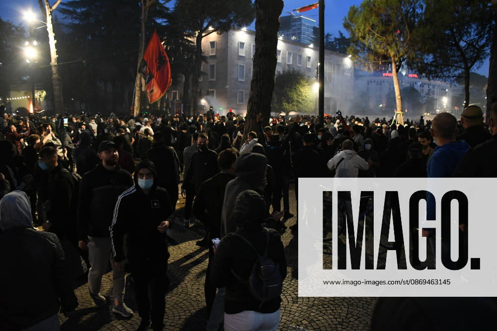 Student protest turns violent outside Education Ministry in Tirana TIRANA, ALBANIA - OCTOBER 14: Demonstrators gather outside Albania s Education Ministry during a protest demanding better university conditions, on October 14, 2026 in Tirana, Albania. Students and other participants threw Molotov cocktails and stones at the ministry building and security forces, while some trash containers were set on fire. Police used water cannon and tear gas to disperse the crowd, and several protesters were injured during the clashes. Olsi Shehu Anadolu Tirana Albania. Editorial use only. Please get in touch for any other usage.