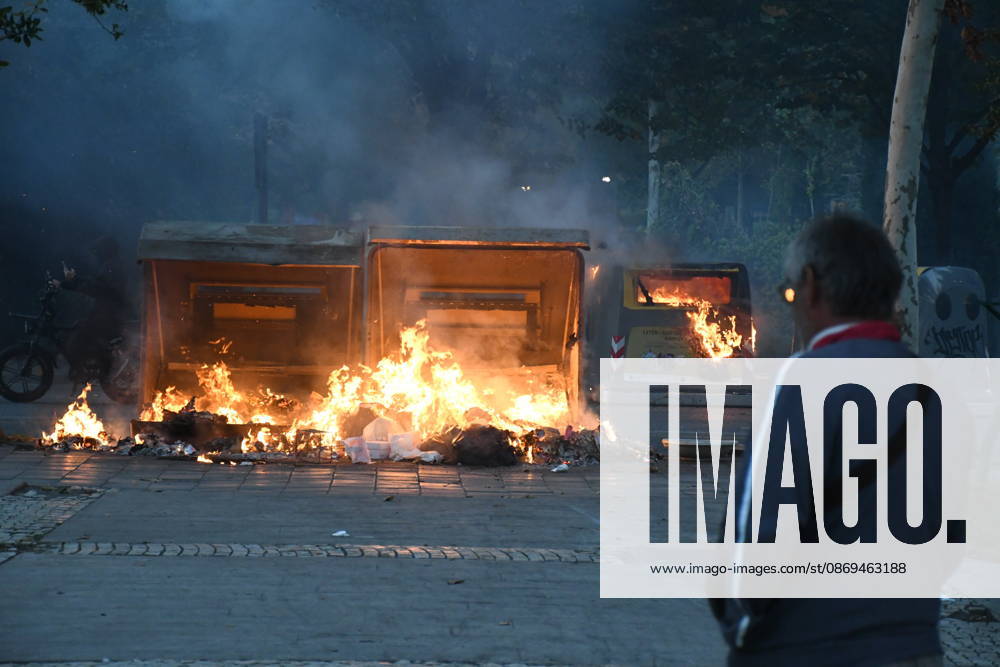 Student protest turns violent outside Education Ministry in Tirana TIRANA, ALBANIA - OCTOBER 14: Flames engulf trash containers during a protest demanding better university conditions, on October 14, 2026 in Tirana, Albania. Students and other participants threw Molotov cocktails and stones at the ministry building and security forces, while some trash containers were set on fire. Police used water cannon and tear gas to disperse the crowd, and several protesters were injured during the clashes. Olsi Shehu Anadolu Tirana Albania. Editorial use only. Please get in touch for any other usage.