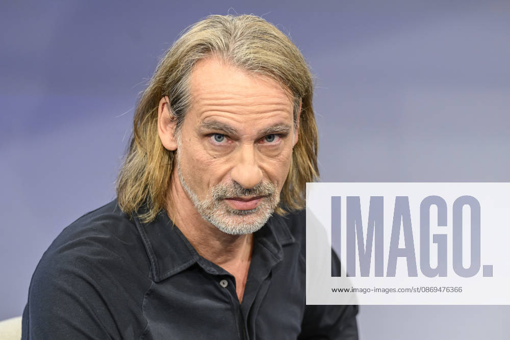 Pictured, from left: Richard David Precht, philosopher, GER, Berlin, studio, guest on *Maischberger*, a political talk show, TV program, hosted by Sandra Maischberger, Das Erste, from Adlershof – Studio 20, October 14, 2026,