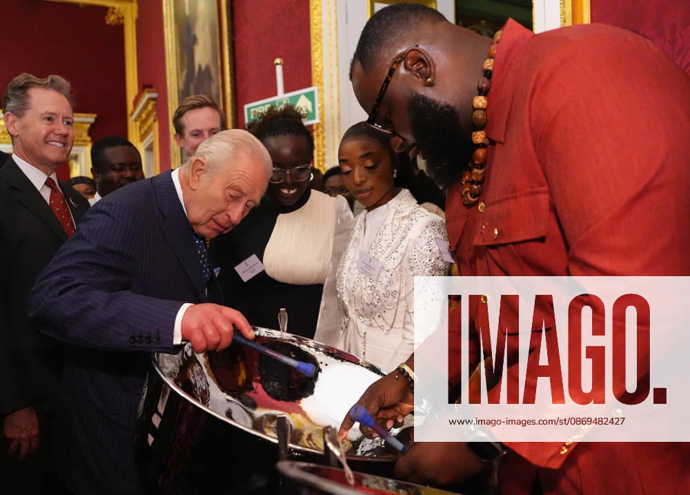 King Charles mattends a Commonmwealth Diaspora Reception King Charles tries his hand at playing a steelpan drum with Khan Cordice, during a reception to celebrate the Commonwealth Diaspora, at St Jamess Palace, London, UK, on the 14th of October 2026. Picture by Aaron Chown WPA-Pool London St Jamess Palace London UK WHA-0831