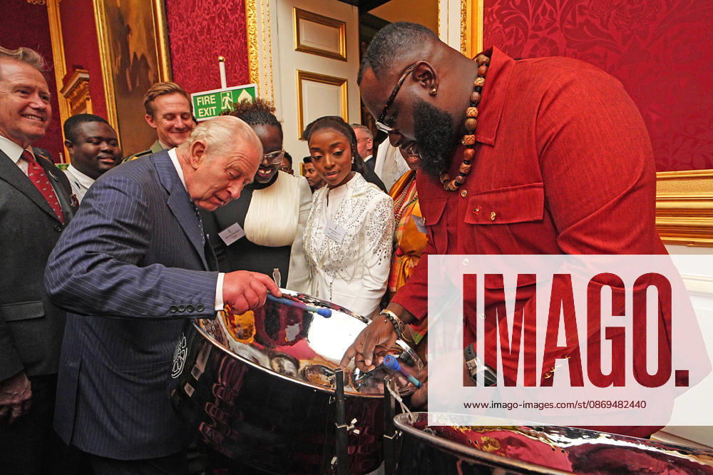 King Charles mattends a Commonmwealth Diaspora Reception King Charles tries his hand at playing a steelpan drum with Khan Cordice, during a reception to celebrate the Commonwealth Diaspora, at St Jamess Palace, London, UK, on the 14th of October 2026. Picture by Aaron Chown WPA-Pool London St Jamess Palace London UK WHA-0831