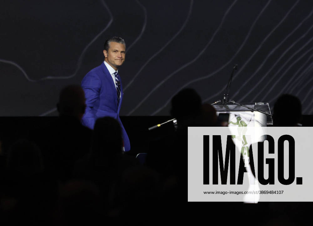 U.S. Secretary of War Pete Hegseth enters a discussion during the U.S. Army s 2026 Annual Meeting and Exposition, AUSA at the Walter E. Washington Convention Center in Washington, DC, USA, on October 14, 2026. Secretary Hegseth participated in a discussion on the future of autonomous warfare. Washington USA - ZUMAs337 20261014_znp_s337_016