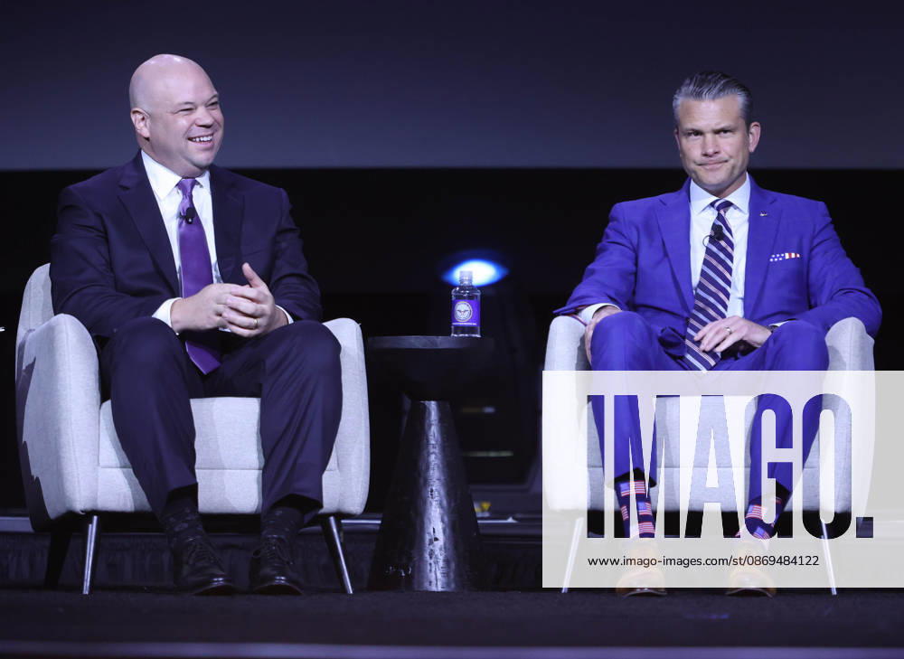 Acting US Secretary of the Army Adam Telle (L) and US Secretary of Defence Pete Hegseth (R) participate in a panel discussion during the U.S. Army s 2026 Annual Meeting and Exposition, AUSA at the Walter E. Washington Convention Center in Washington, DC, USA, on October 14, 2026. Secretary Hegseth participated in a discussion on the future of autonomous warfare. Washington USA - ZUMAs337 20261014_znp_s337_020