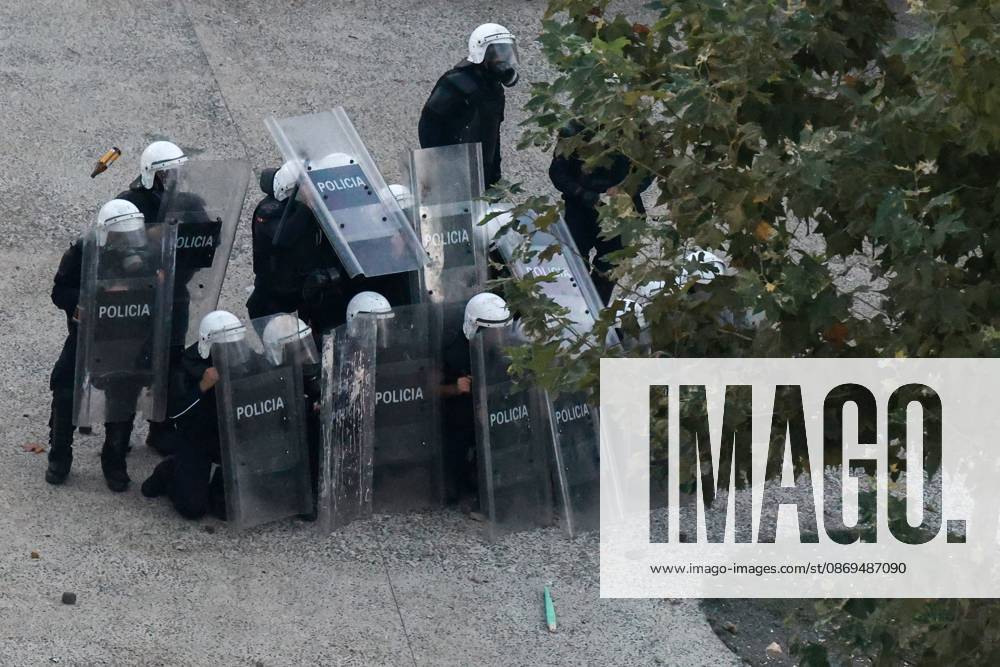TIRANA, ALBANIA, OCTOBER 14, 2026: Demonstrators clash with riot police during student-led protests over rising education costs, university conditions and alleged corruption in Tirana. Fires damage the Ministry of Education and bank premises as protesters throw stones and other objects, while police use tear gas and water cannons. Tirana Albania - ZUMAq101 20261014_zna_q101_281