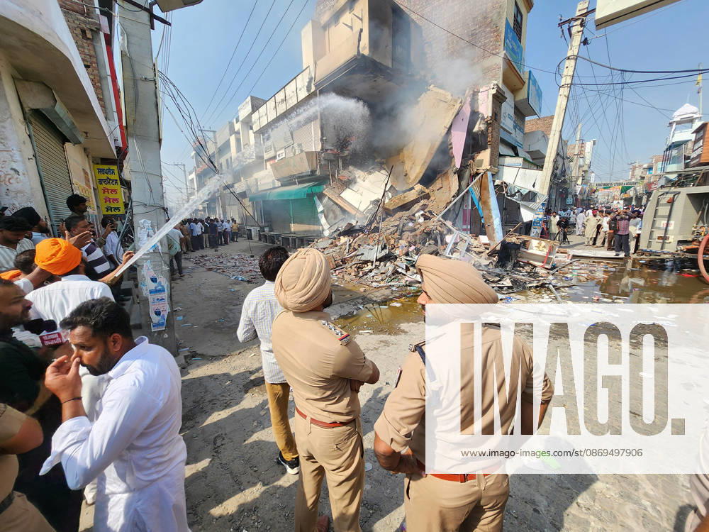 Angry activists and supporters vandalize the property and medical store of chemist Ashwini Kumar on October 14, 2026 in Bathinda, India. Outrage erupted across the Malwa region following the murder of prominent anti-drug crusader Parvinder Singh Jhota, who was shot dead inside a Mansa chemist shop during a Facebook Live stream on October 13 while confronting the store owner over the illicit sale of habit-forming pharma drugs. Protesters broke open shutters, damaged fixtures, and enforced market shutdowns across the region to demand strict action against the perpetrator and government intervention regarding Punjab s drug menace. Police personnel deployed multi-layer security cordons to restore order and control