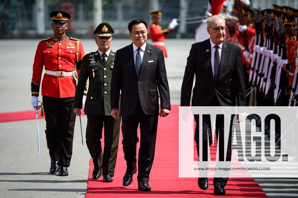 Swiss President Guy Parmelin Arrives in Thailand for Official Visit BANGKOK, THAILAND - OCTOBER 15, 2026: Thailands Prime Minister Anutin Charnvirakul (L) and Swiss President Guy Parmelin (R) inspect an honour guard at Government House in Bangkok during Parmelins official visit to Thailand as a guest of the government. Bangkok