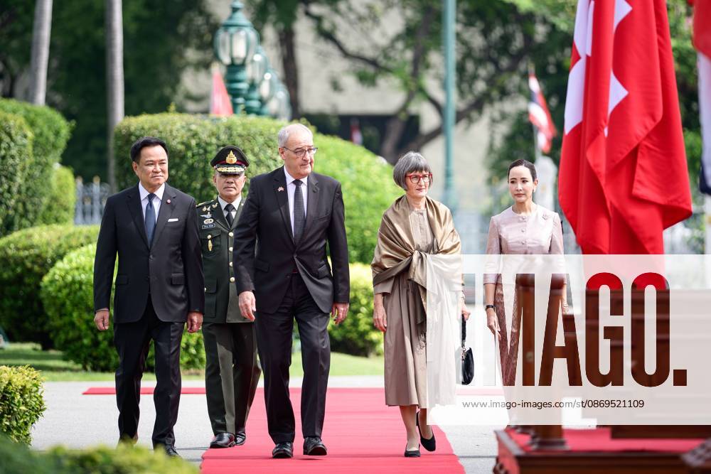 Swiss President Guy Parmelin Arrives in Thailand for Official Visit BANGKOK, THAILAND - OCTOBER 15, 2026: (FROM LEFT TO RIGHT) Thailands Prime Minister Anutin Charnvirakul and Swiss President Guy Parmelin, accompanied by their spouses, Caroline Parmelin and the Thai prime ministers spouse, Thananon Charnvirakul attend a ceremonial welcome and inspect an honour guard at Government House in Bangkok during Parmelins official visit to Thailand as a guest of the government. Bangkok