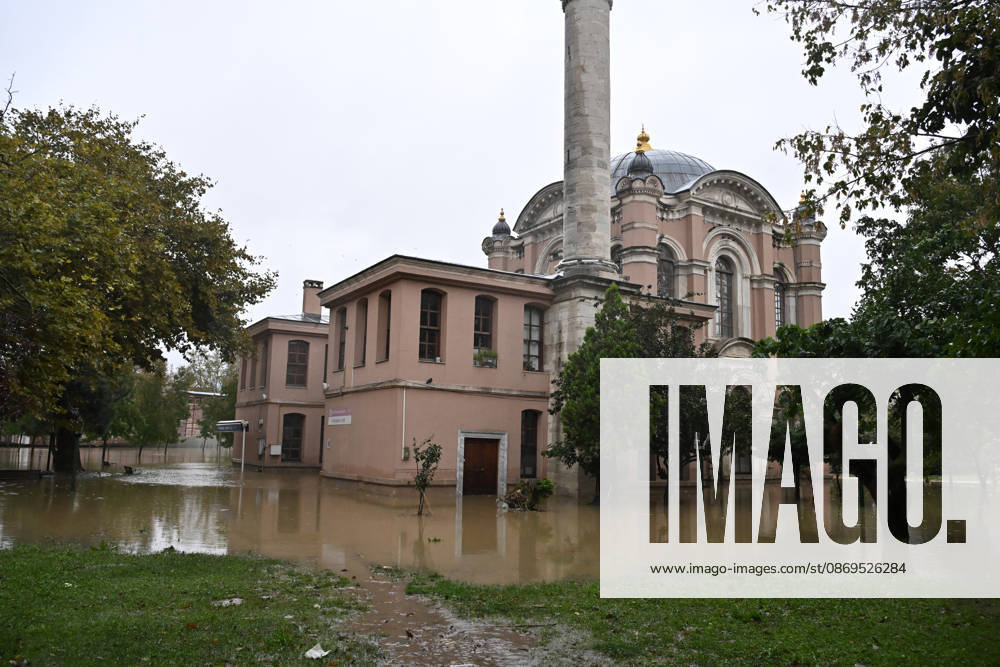 Historic Sadabat Mosque and surrounding structures submerged as Kagithane Stream overflows in Istanbul ISTANBUL, TURKIYE - OCTOBER 15: Floodwaters surround the historic Sadabat Camii (Aziziye Mosque) and surrounding structures in the Kagithane district of Istanbul, Turkiye on October 15, 2026. Heavy downpours caused the Kagithane Stream to overflow its banks, inundating nearby historical sites, courtyards, and streets. Isa Terli Anadolu Istanbul Turkey. Editorial use only. Please get in touch for any other usage.