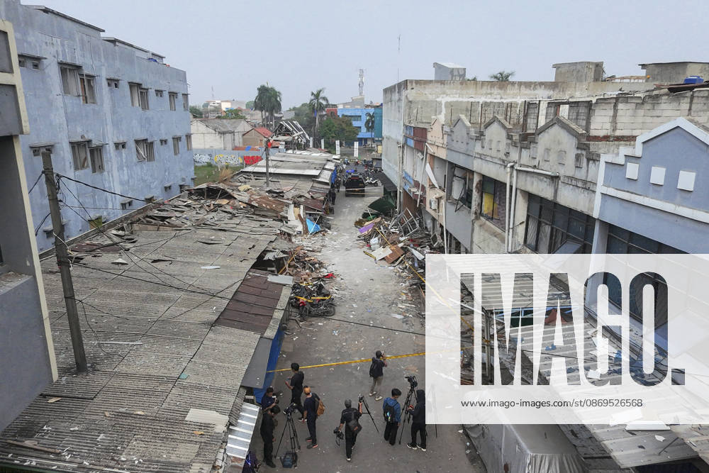 Blast at Indonesian market kills 2, injures 11 in South Tangerang BANTEN, INDONESIA - OCTOBER 15: An aerial view shows damaged shop-house buildings and debris scattered across the site of an explosion at a market in South Tangerang, on the outskirt of Jakarta, Indonesia, on October 15, 2026. The blast killed two people and injured at least 11 others, according to police. Investigators are examining the cause of the explosion after finding an ethylene gas cylinder at the site. The blast damaged shop-house buildings and scattered debris across the surrounding commercial area. Agoes Rudianto Anadolu Banten Indonesia. Editorial use only. Please get in touch for any other usage.