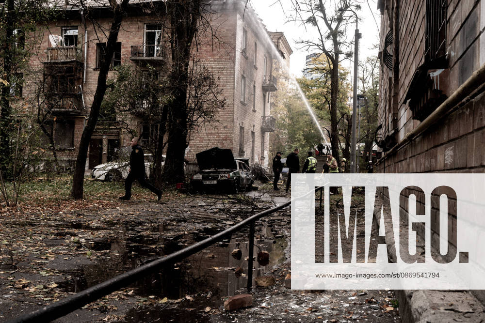 Aftermath of Russian drone attack in Kyiv KYIV, UKRAINE - OCTOBER 15: Firefighters operate following a Russian drone strikes a residential area in the city center, injuring a man who was near the impact site, in Kyiv, Ukraine, on October 15, 2026. Vincenzo Circosta Anadolu Kyiv Ukraine. Editorial use only. Please get in touch for any other usage.
