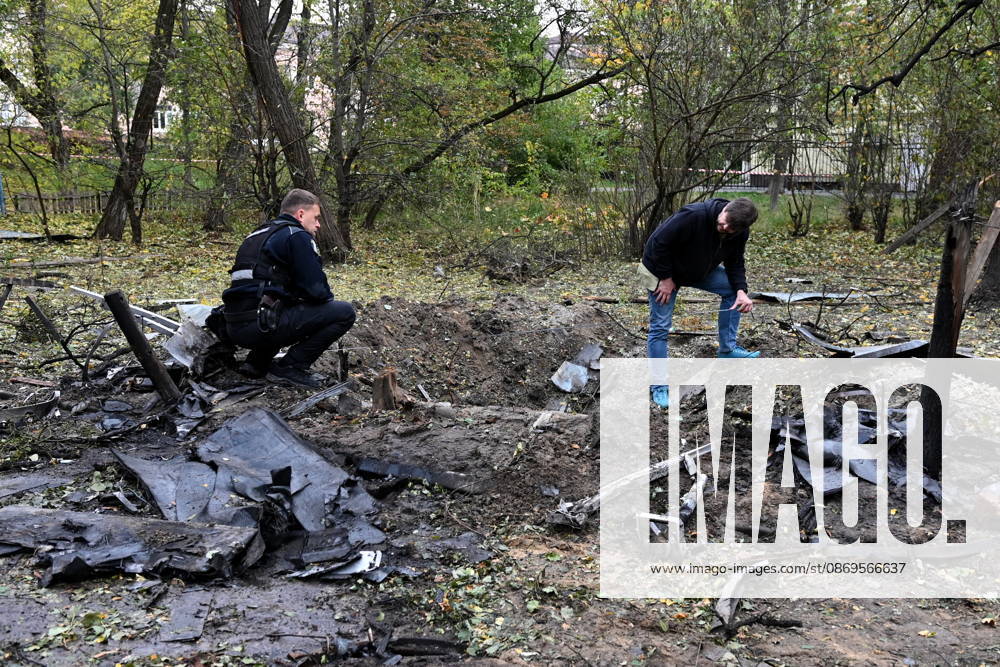 Aftermath Of A Russian Drone Attack In Kyiv, 15 Oct 2026 Police and an expert work at the site of a crater near a damaged residential building following the explosion of a Geran-5 jet-powered drone in Kyiv, Ukraine, on October 15, 2026. Kyiv Ukraine