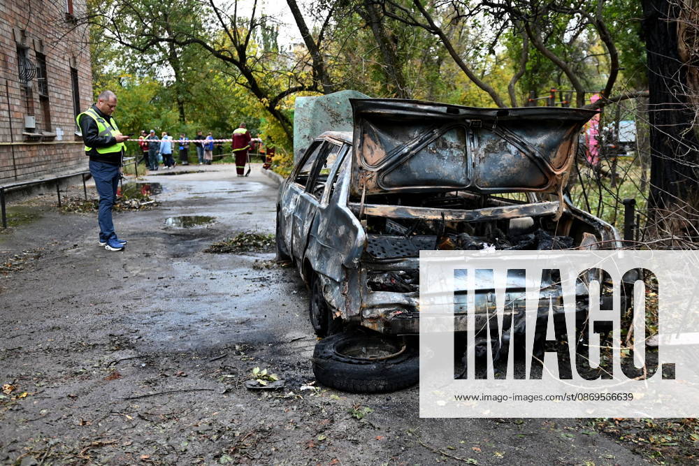 Aftermath Of A Russian Drone Attack In Kyiv, 15 Oct 2026 Police inspect a burnt-out car near a damaged residential building following the explosion of a Geran-5 jet-powered drone in Kyiv, Ukraine, on October 15, 2026. Kyiv Ukraine