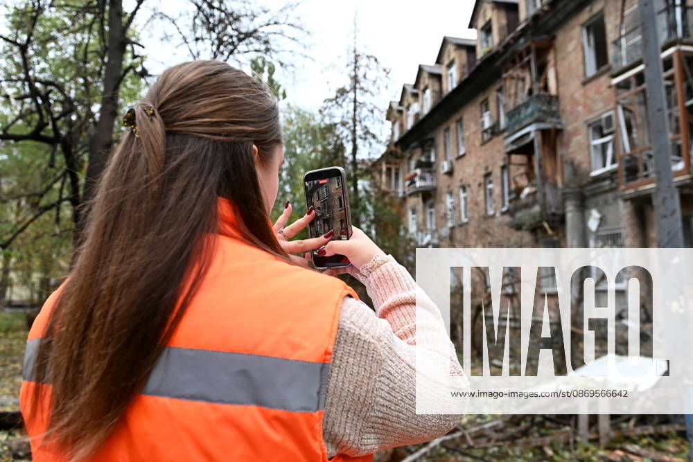 Aftermath Of A Russian Drone Attack In Kyiv, 15 Oct 2026 A woman photographs a damaged residential building following an explosion caused by a Geran-5 jet-powered drone in Kyiv, Ukraine, on October 15, 2026. Kyiv Ukraine