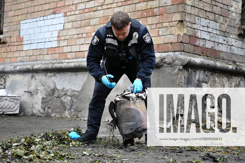 Aftermath Of A Russian Drone Attack In Kyiv, 15 Oct 2026 A police expert examines the engine of a Geran-5 jet-powered drone near a residential building damaged during a Russian attack in Kyiv, Ukraine, on October 15, 2026. Kyiv Ukraine