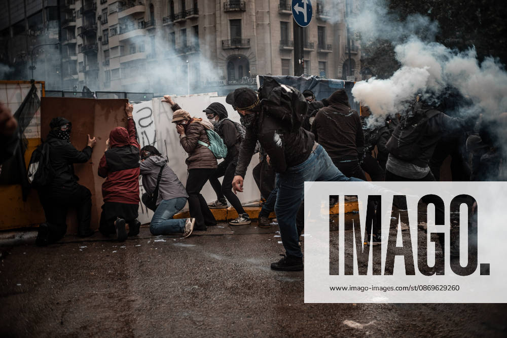 Police forces deploy tear gas, water cannon trucks and rubber bullets against demonstrators during the Fifth Federal University March near Congress, as protesters demand the implementation of the University Funding Law and oppose President Javier Mileis austerity policies. The protest takes place amid the governments broader deregulation agenda, including Decree 70 2023 Buenos Aires Argentina - ZUMAf175 20261015_zip_f175_015