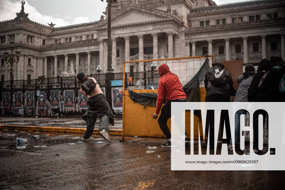 Police forces deploy tear gas, water cannon trucks and rubber bullets against demonstrators during the Fifth Federal University March near Congress, as protesters demand the implementation of the University Funding Law and oppose President Javier Mileis austerity policies. The protest takes place amid the governments broader deregulation agenda, including Decree 70 2023 Buenos Aires Argentina - ZUMAf175 20261015_zip_f175_018
