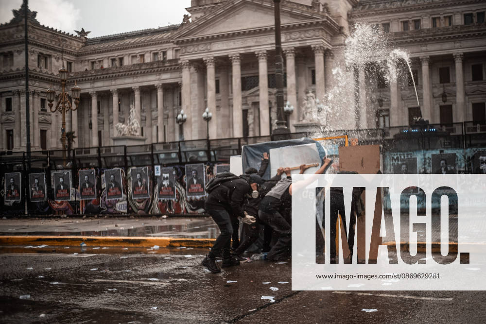 Police forces deploy tear gas, water cannon trucks and rubber bullets against demonstrators during the Fifth Federal University March near Congress, as protesters demand the implementation of the University Funding Law and oppose President Javier Mileis austerity policies. The protest takes place amid the governments broader deregulation agenda, including Decree 70 2023 Buenos Aires Argentina - ZUMAf175 20261015_zip_f175_023